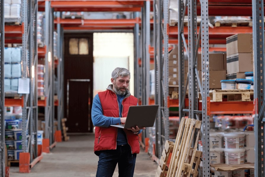 a wholesale distributor walking in warehouse