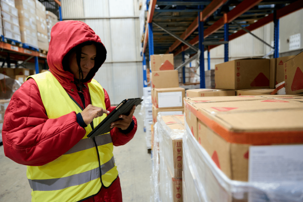 warehouse worker using Warehouse Management Software for Small Business
