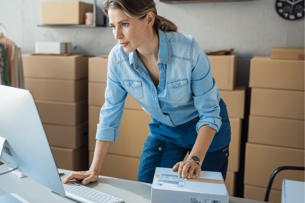 woman using Warehouse Management Software for Small Business